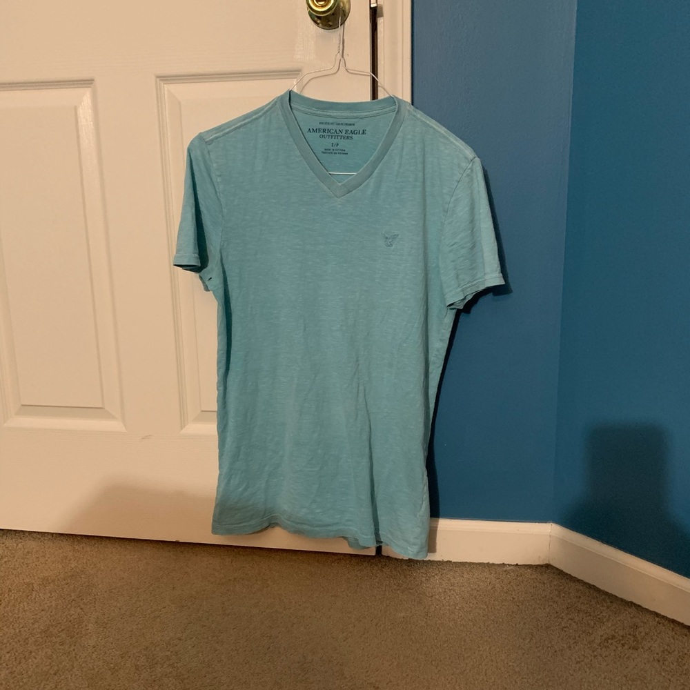 Light blue V neck